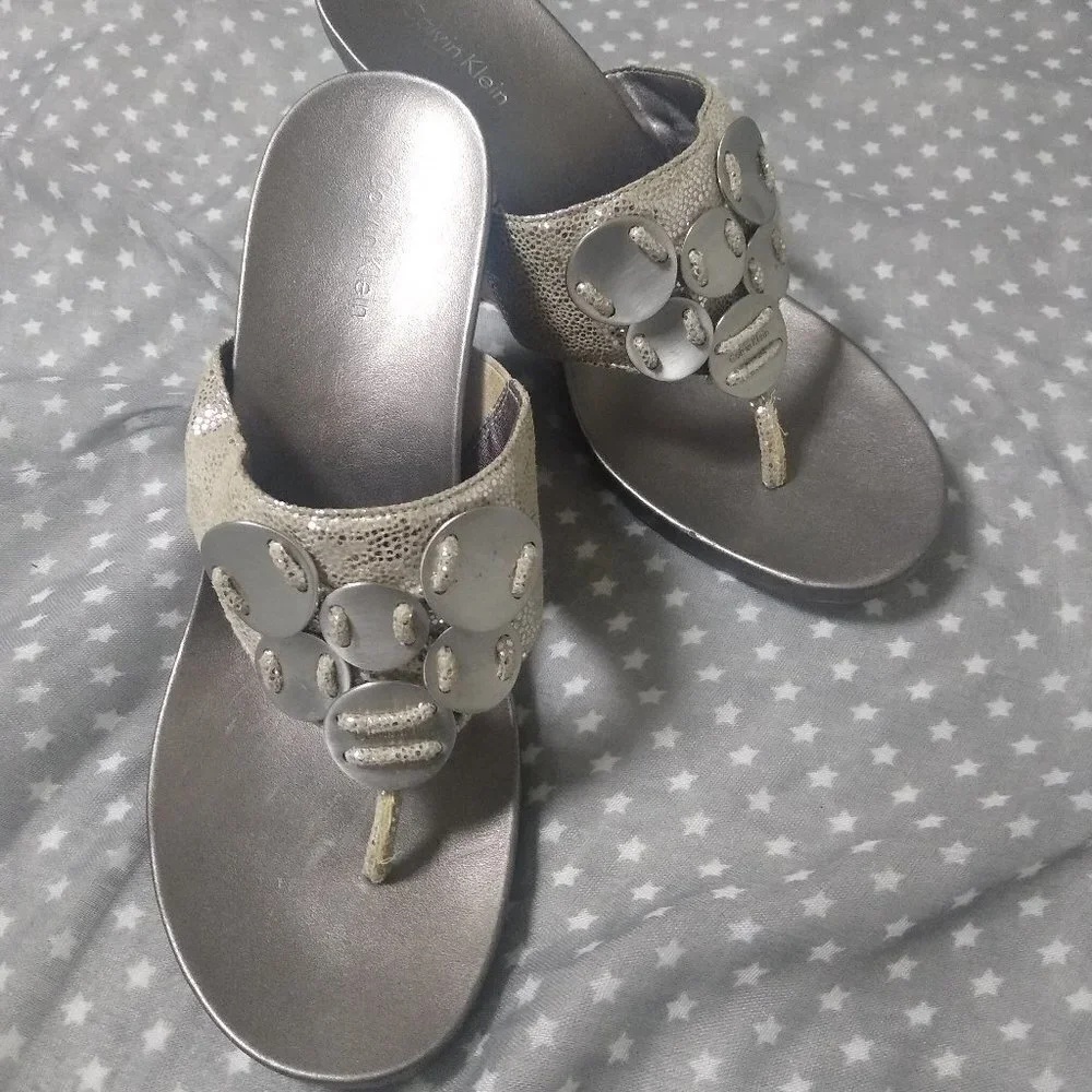 CALVIN KLEIN METALLIC SILVER WEDGE HEELS
